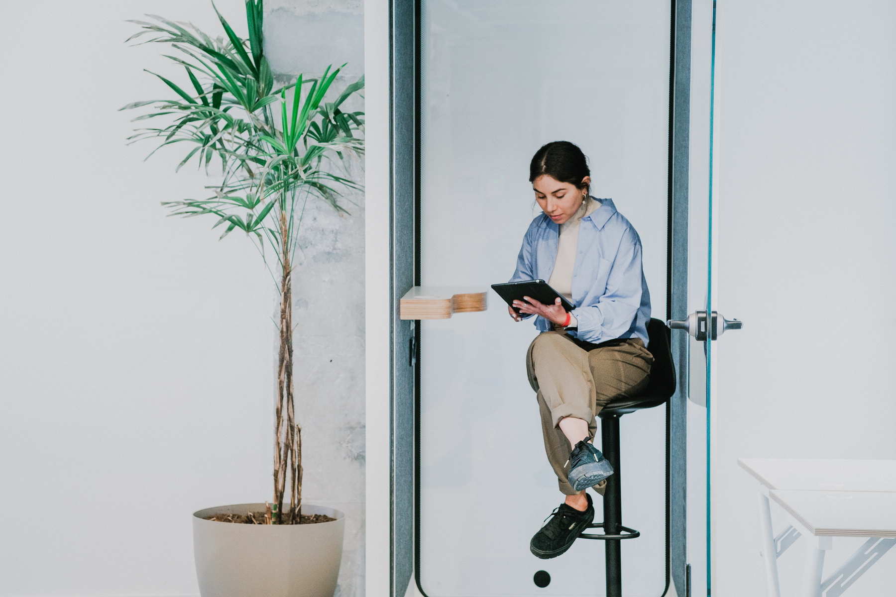 Cool Corporate Woman Using a Tablet